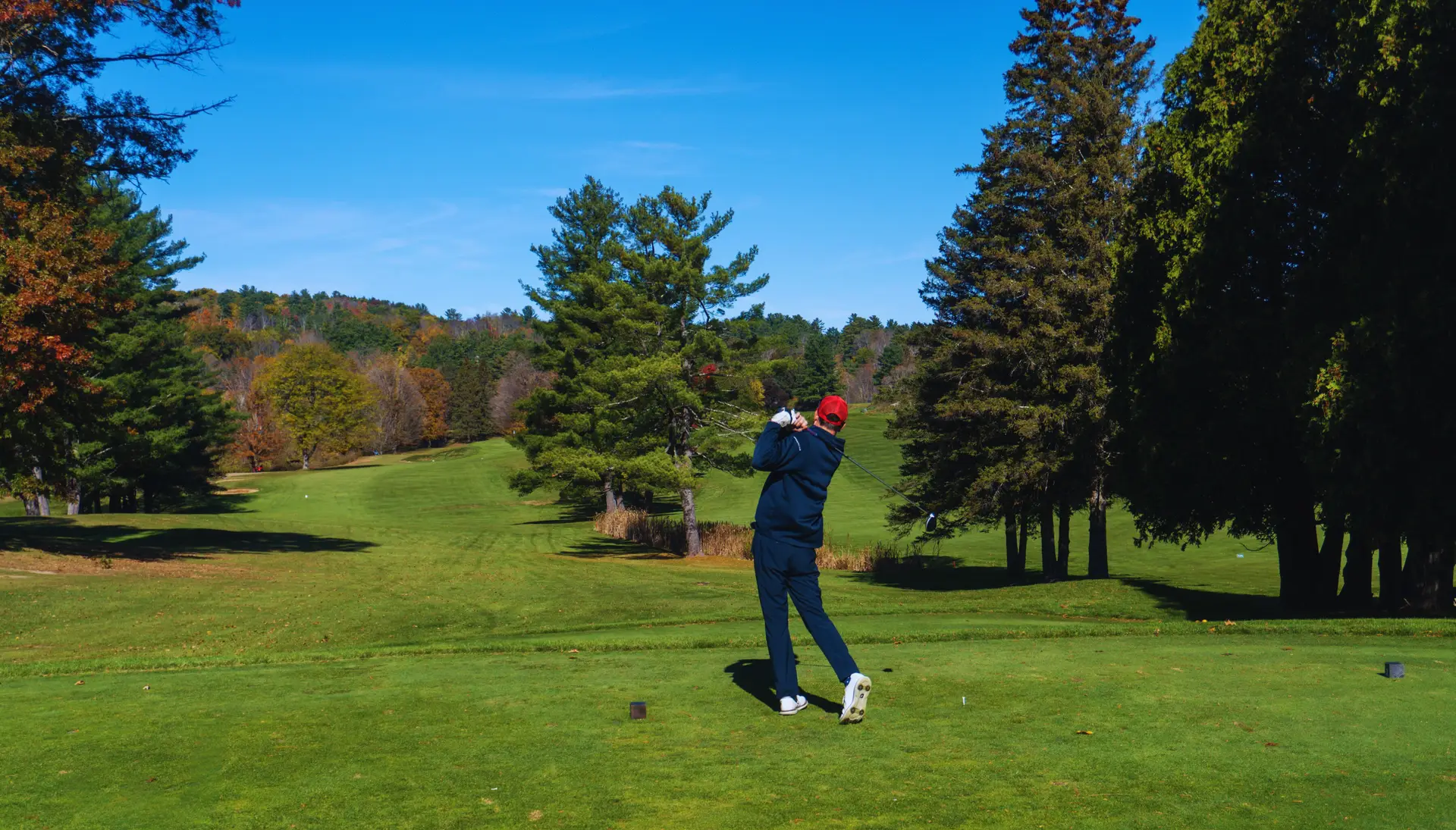 A Green Mountain Classic golfer teeing off in Vermont